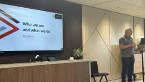 Karen Wilkins Triton's Alan Roberts speaking at SDUG 2026